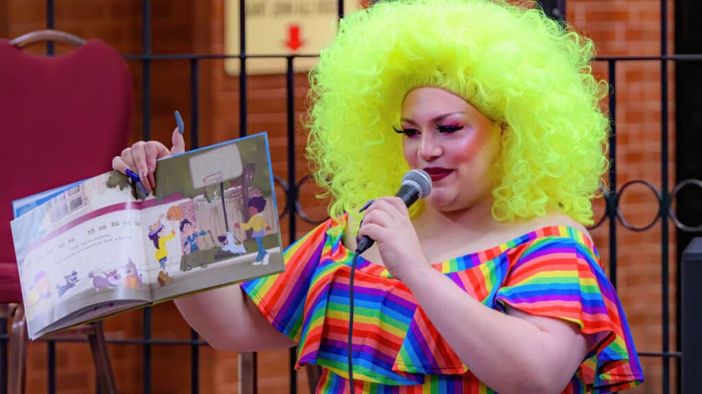 Drag queen reading a kids story.