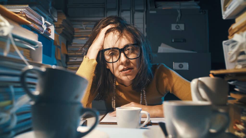 Exhausted woman at work. I