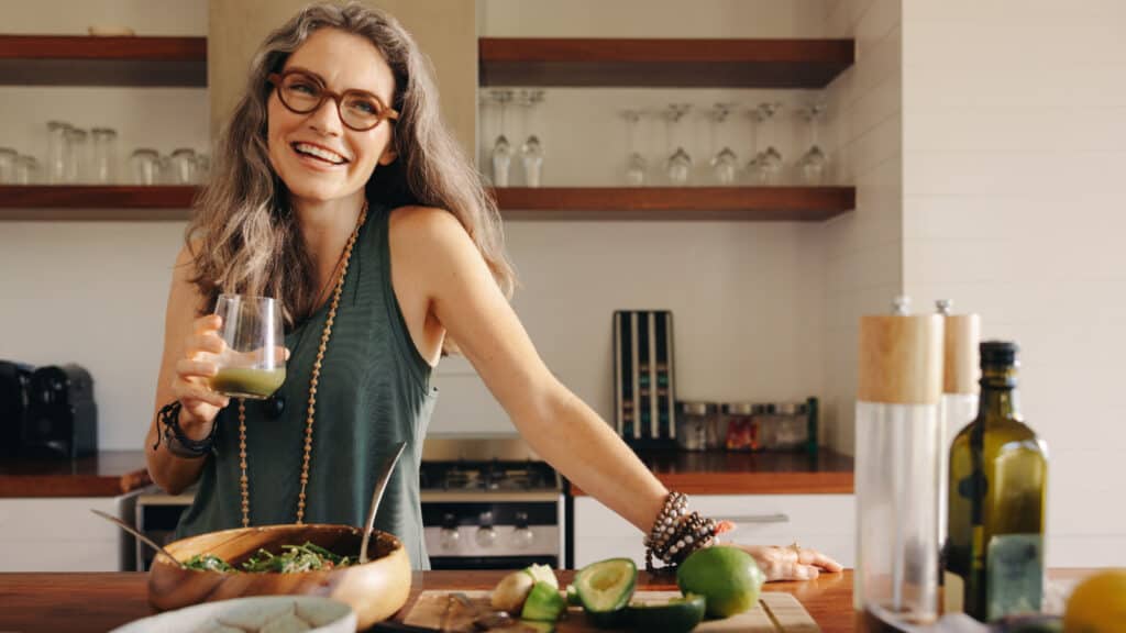woman in kitchen with healthy food.