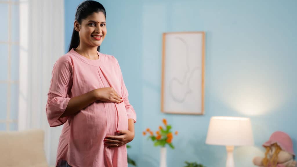 Pregnant Indian woman.
