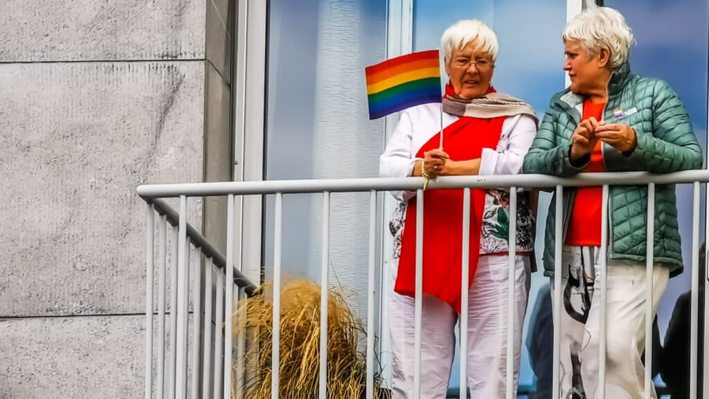 Two older queer women in Belgium. 