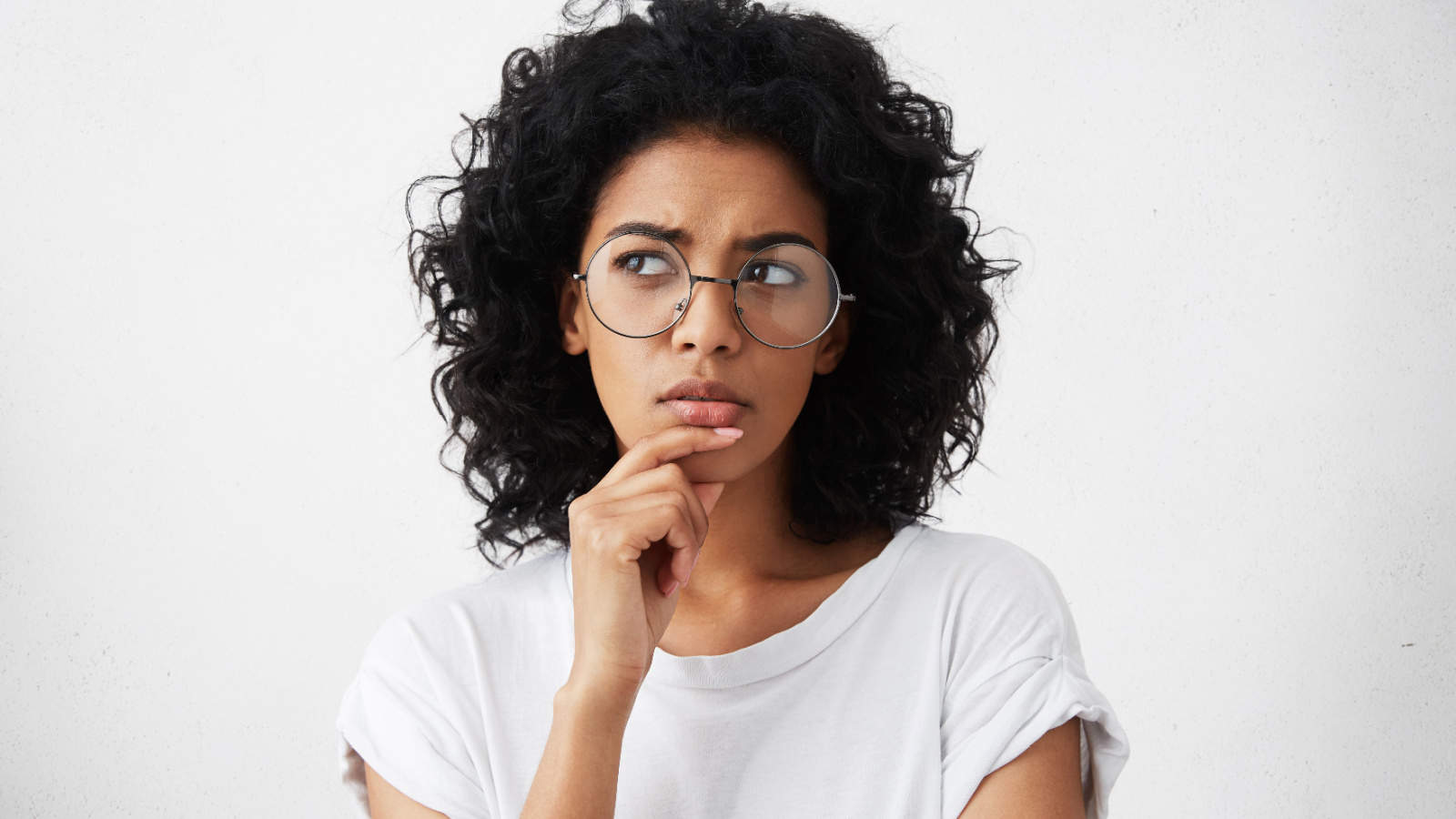 Woman thinking. Questioning. Pondering.