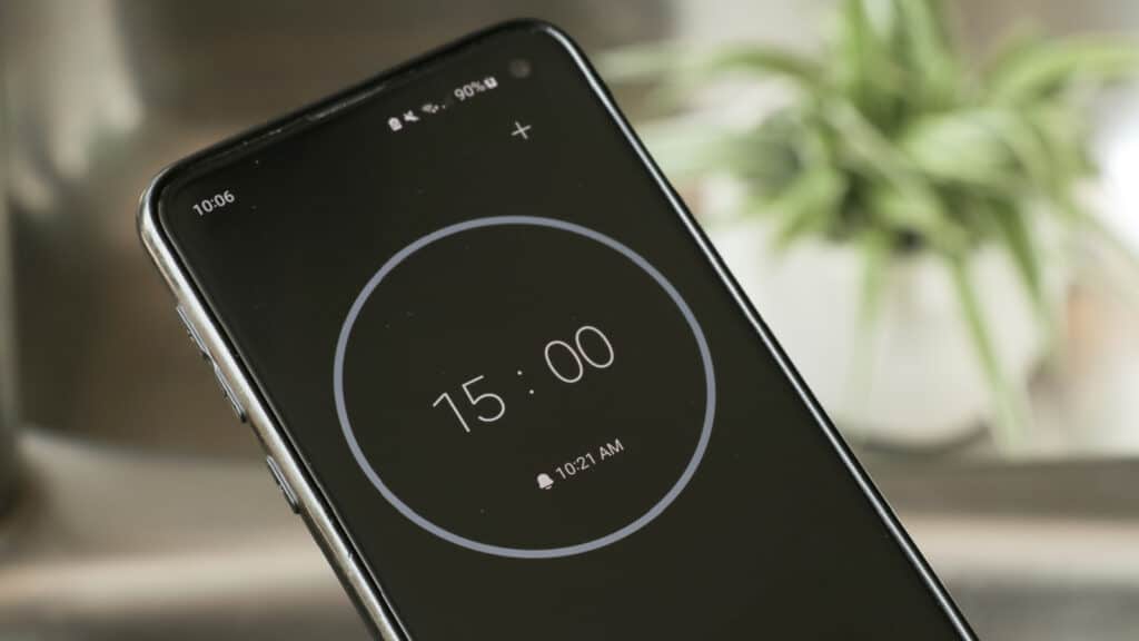 smartphone showing 15 minute timer. 