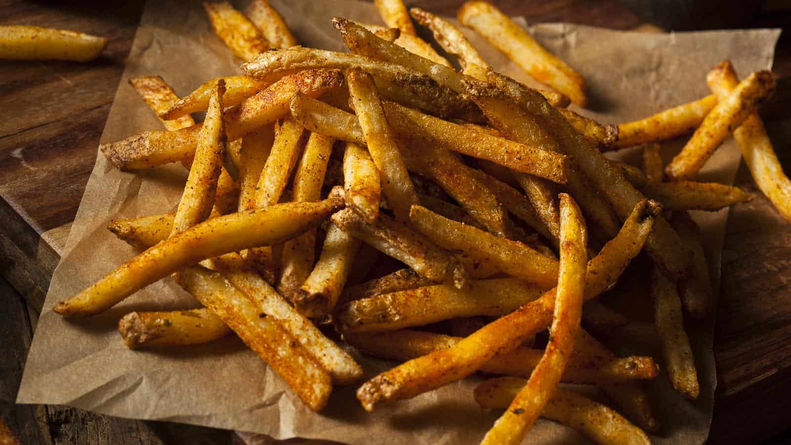 French fries on parchment paper.