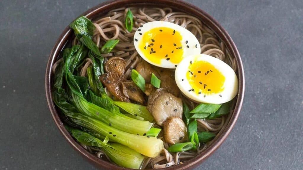 Low-FODMAP-Soba-Miso-Soup-with-Bok-Choy-and-Jammy-Eggs-in-brown-ceramic-bowl.