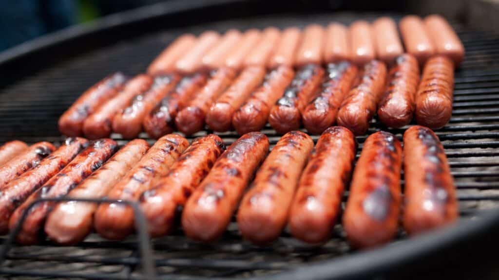 Grilled hot dogs. 