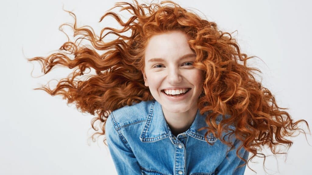Happy redheaded woman.