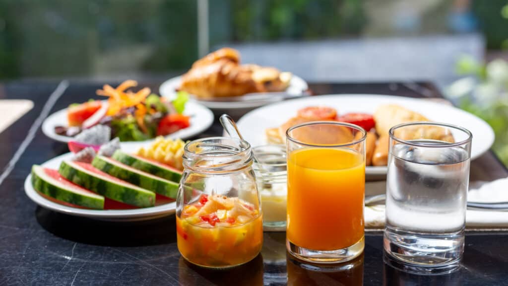Hotel breakfast with fresh orange juice. 