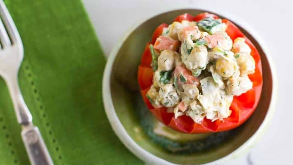 Overhead-image-of-vegan-low-FODMAP-CHICKPEA-Salad-stuffed-into-a-tomato-green-napkin.
