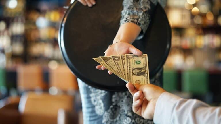 Tipping waitress.