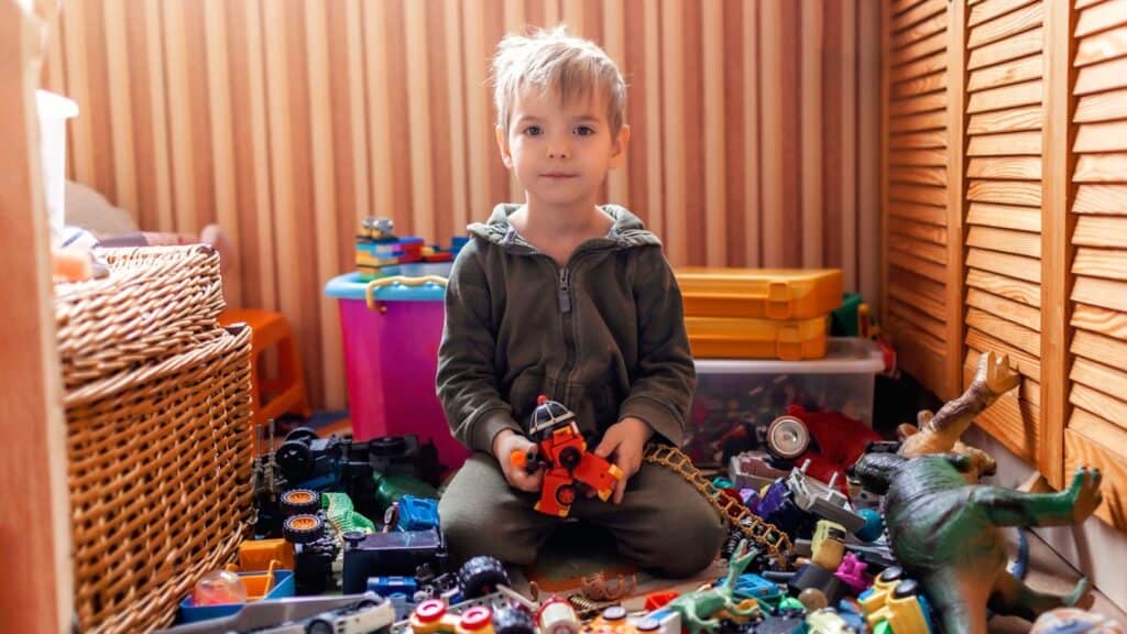 boy with toys.