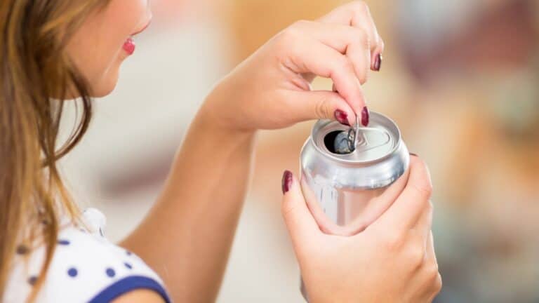 opening soda can.