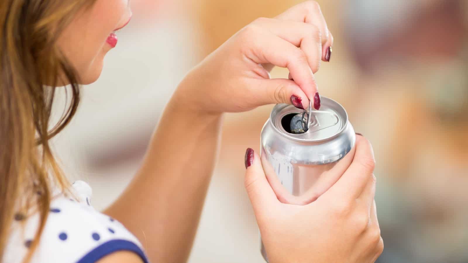 opening soda can.