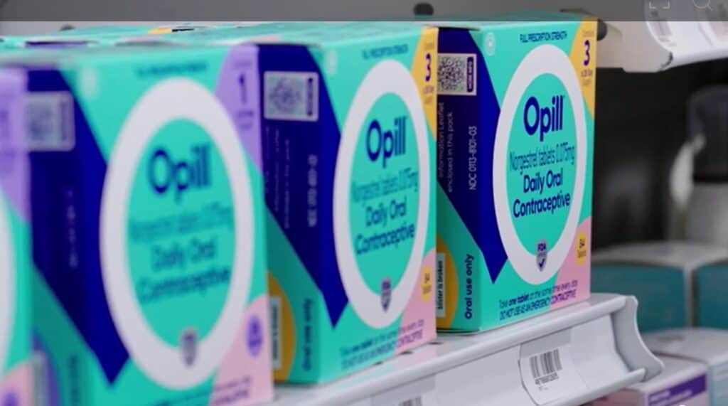 Opill otc contraceptive pill on shelf in store