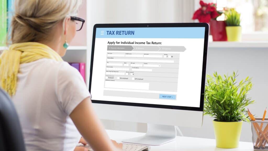 woman doing taxes online.