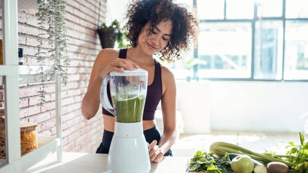 woman making smoothie. 