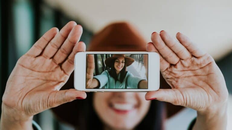woman taking selfie.