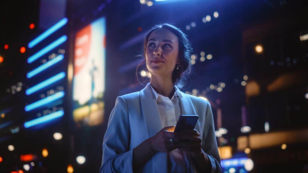 woman using phone at night. 