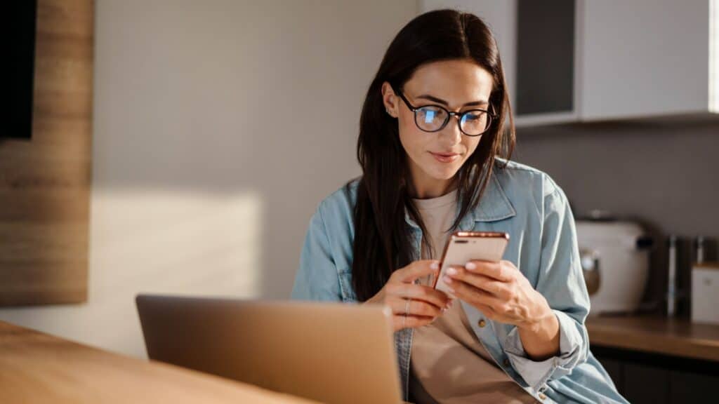 woman using phone.