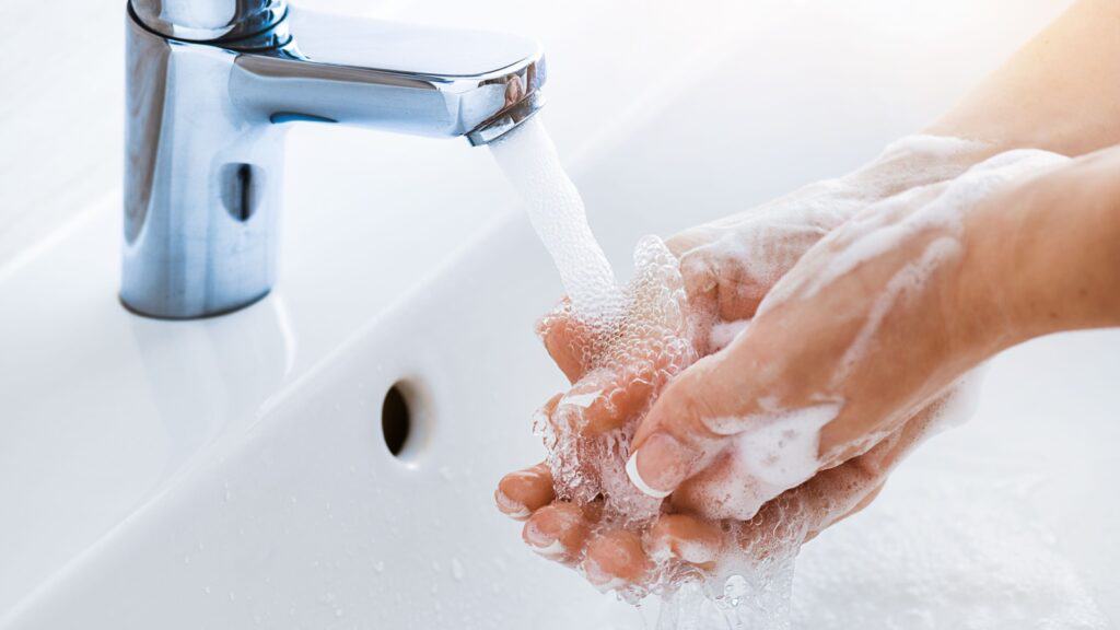 women washing hands. 