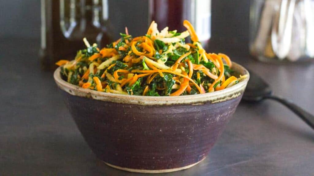 Kale-Carrot-Apple-Salad-in-a-ceramic-bowl.
