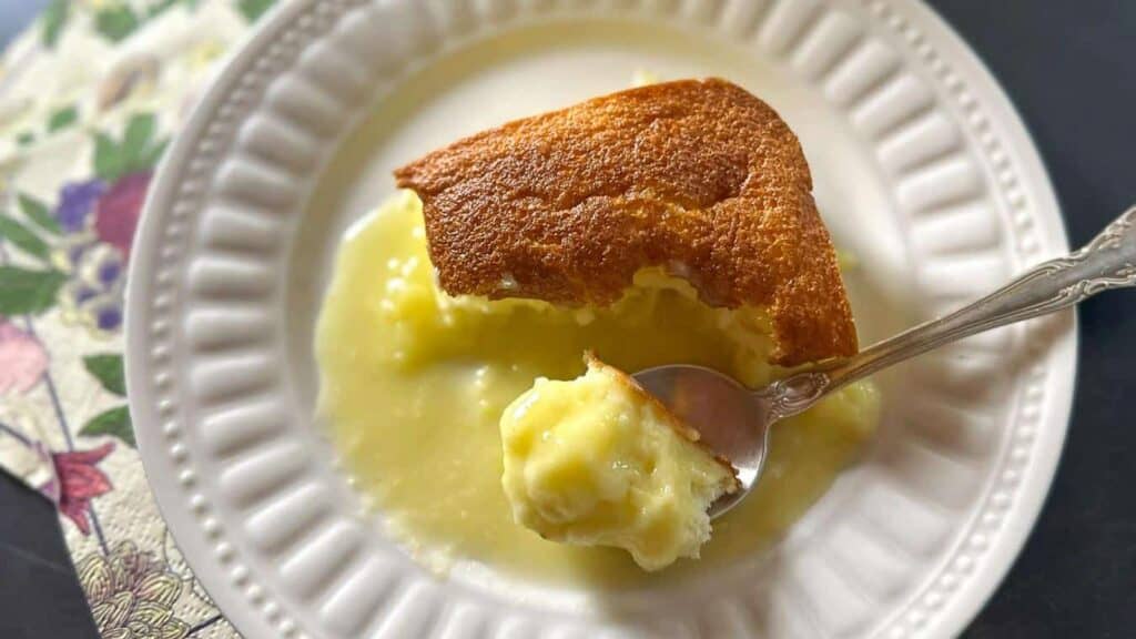 Lemon-Pudding-Cake-in-pan-and-on-plate.-close.