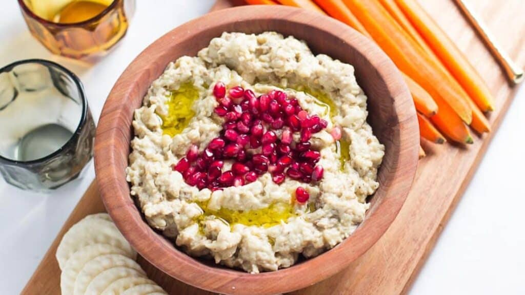 eggplant-dip-in-wooden-bowl-garnished-with-pomegranate-seeds-2.