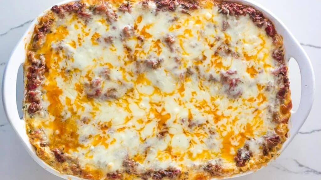 lasagna-fresh-out-of-the-oven-in-white-casserole.