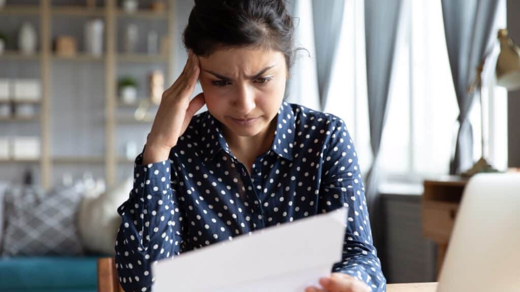 woman studying paperwork. 