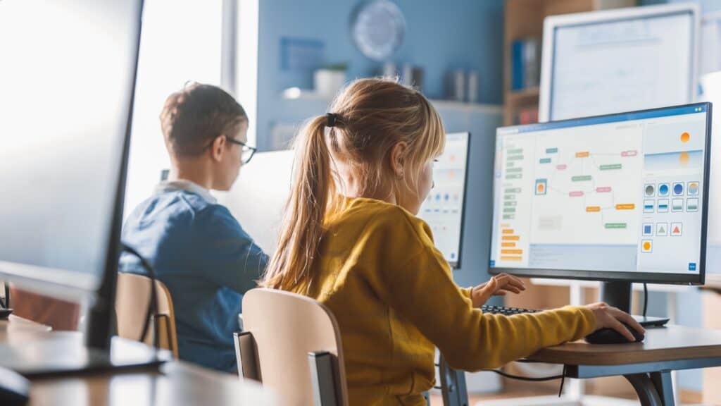 Kids using computer.