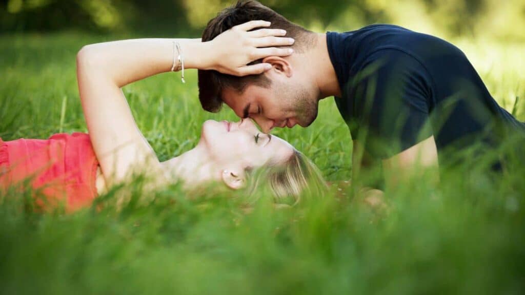Lovers-laying-in-the-grass-Photo-Credit-panajiotis-from-pixabay-via-Canva.