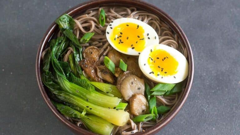 Soba-Miso-Soup-with-Bok-Choy-and-Jammy-Eggs-in-brown-ceramic-bowl.