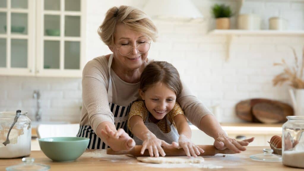 Nana and child baking.