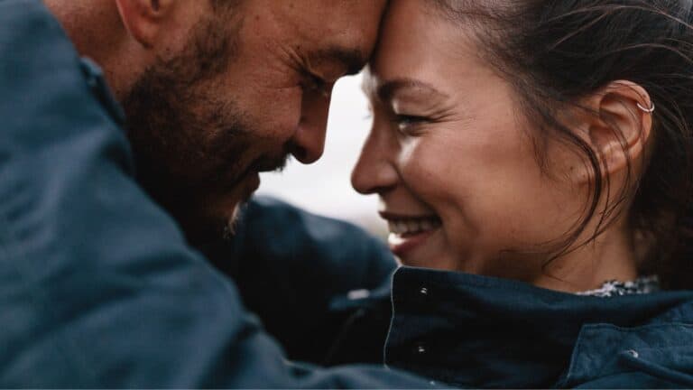 a couple in close embrace.