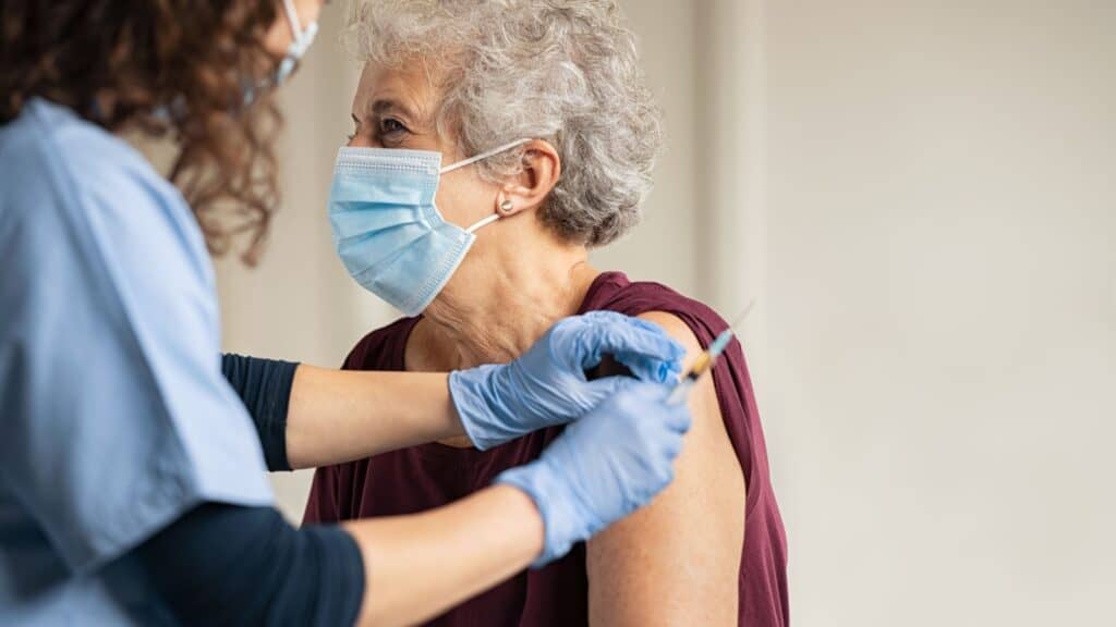 Giving vaccine.