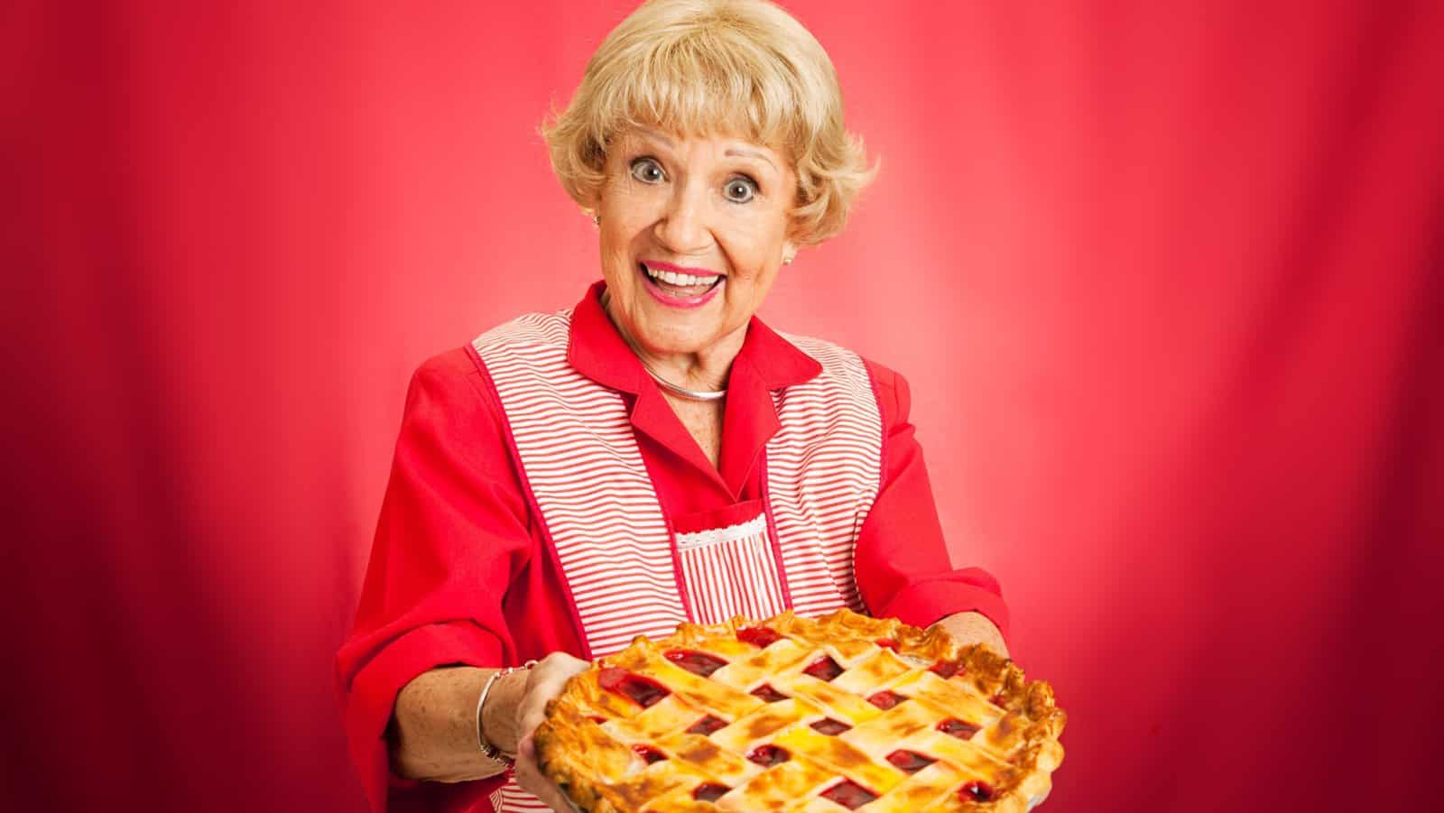 Woman serving pie. Lisa F. Young via Shutterstock.