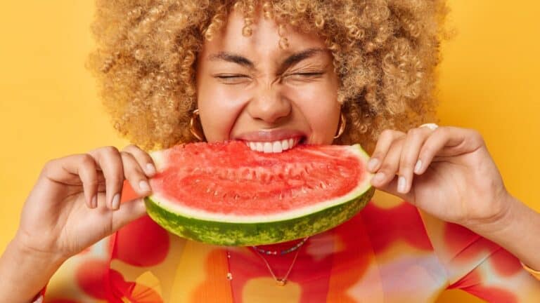 eating watermelon.