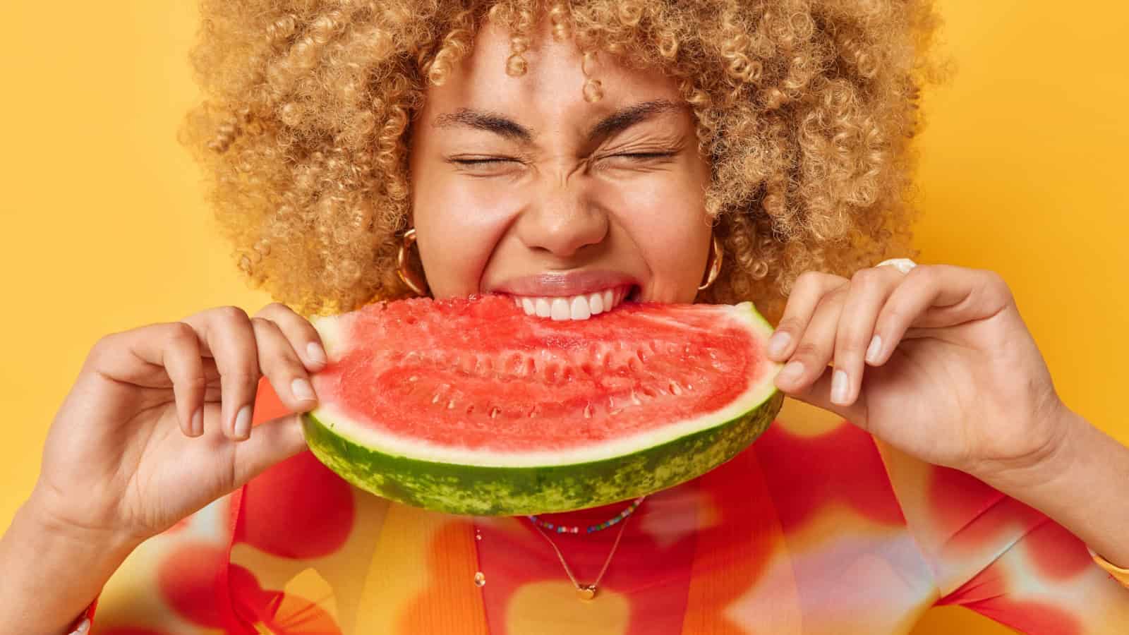eating watermelon.