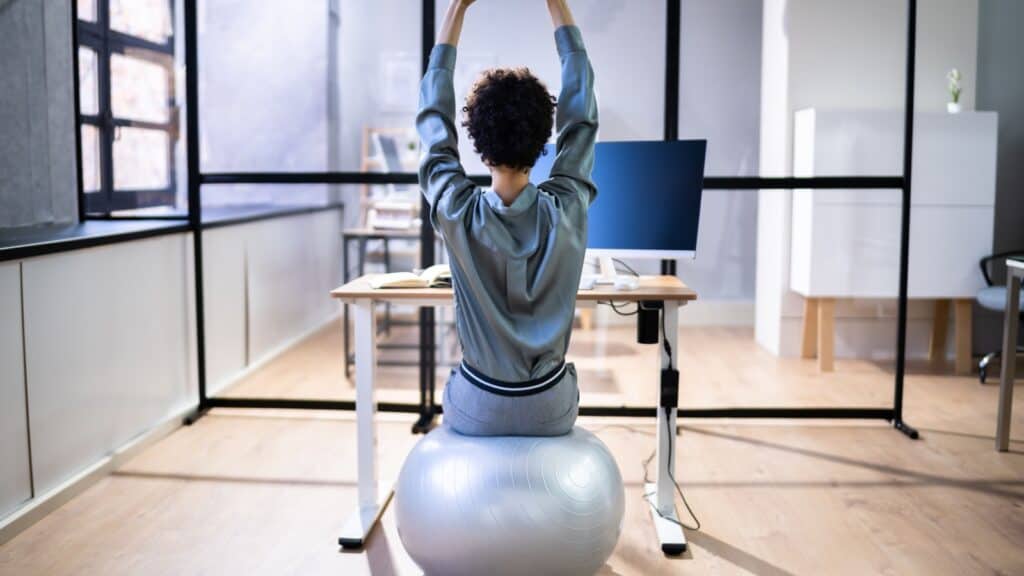sitting on a ball.
