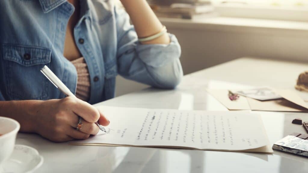 hand writing letters.