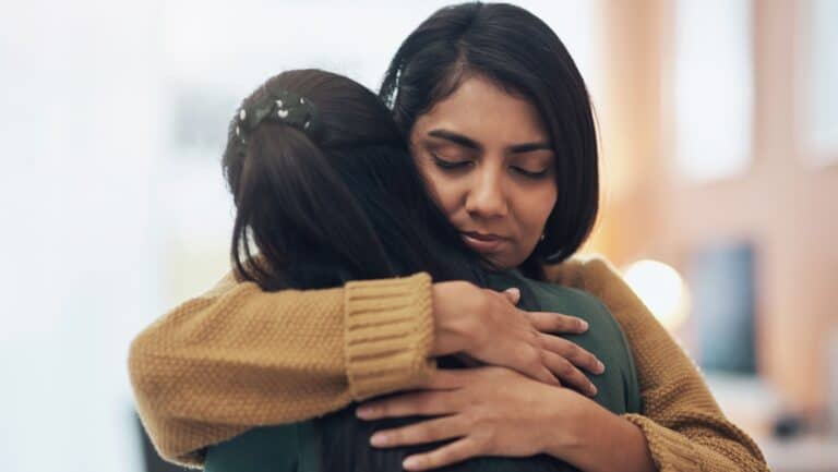 hugging. caring.