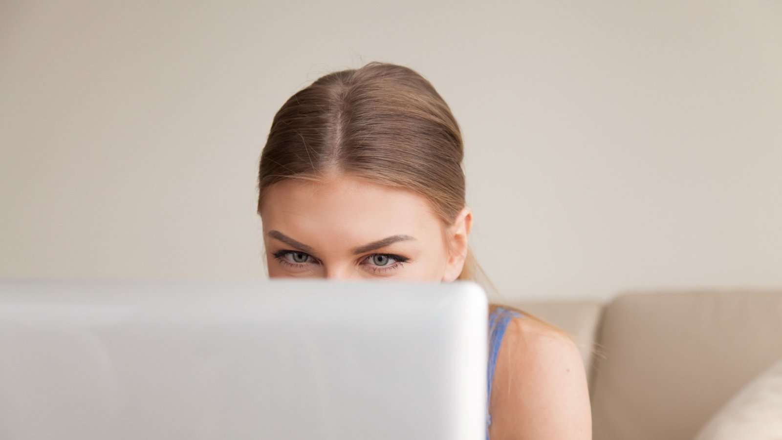teen using laptop computer.