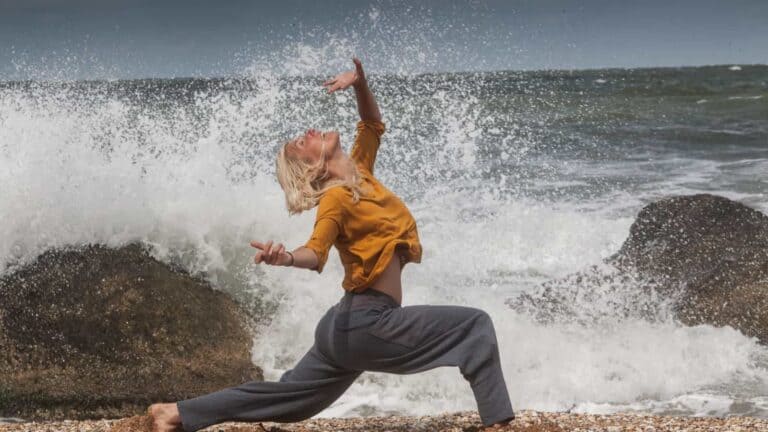 somatic movement woman in front of ocean
