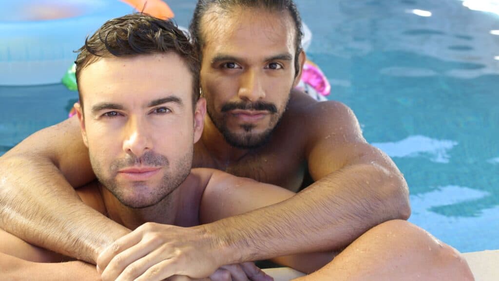 gay couple in pool.