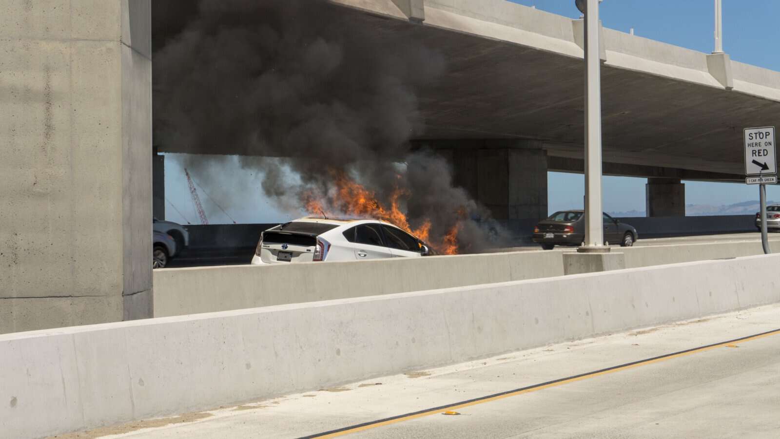 San Francisco,CA 7/8/2018 Freeway accident with Fire Damage on Toyota Corolla Prius Electric vehicle on San Francisco Bay Bridge