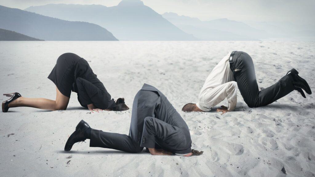 Concept of fear with businessman like an ostrich