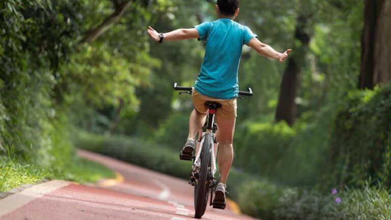 riding bike with no hands.
