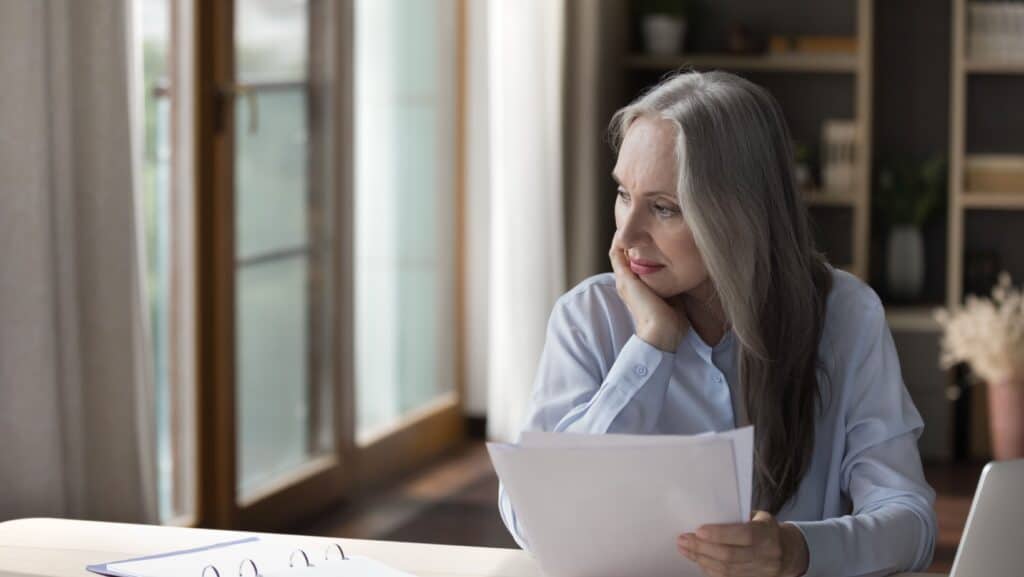 woman with paperwork. Making a will.