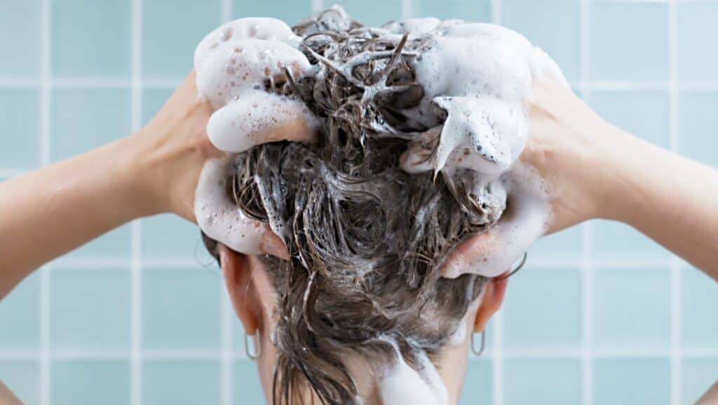 Washing hair. shampoo.