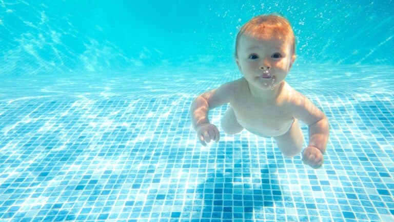 baby under water.